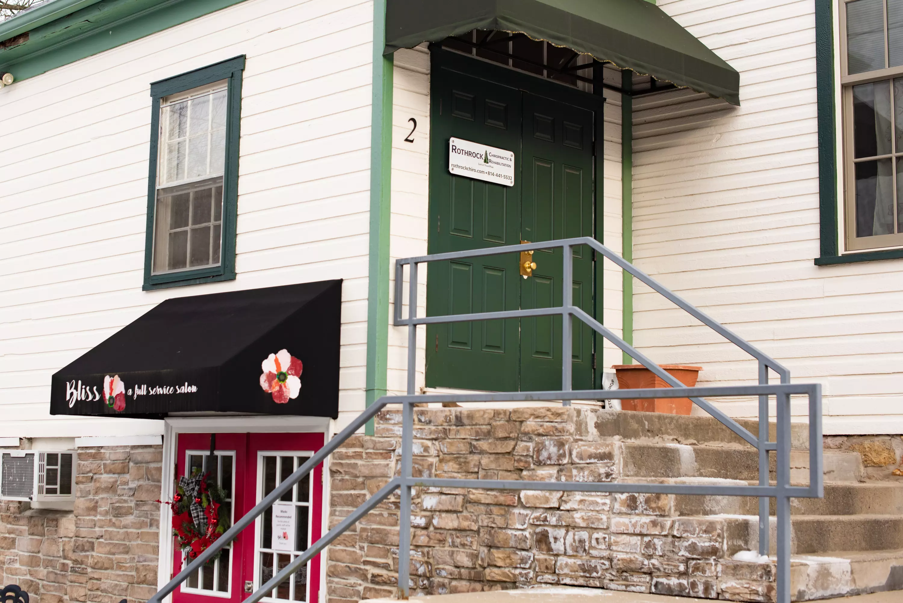 We are located in the Center for Well-Being building. The entrace is up the steps on the side of the building.